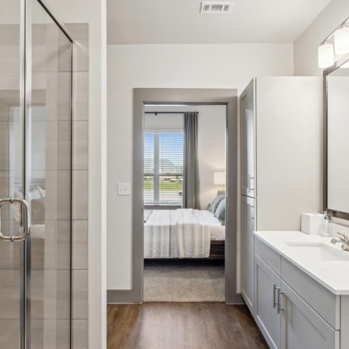 a bathroom with a glass shower