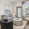 living room with a coch, chair and coffee table