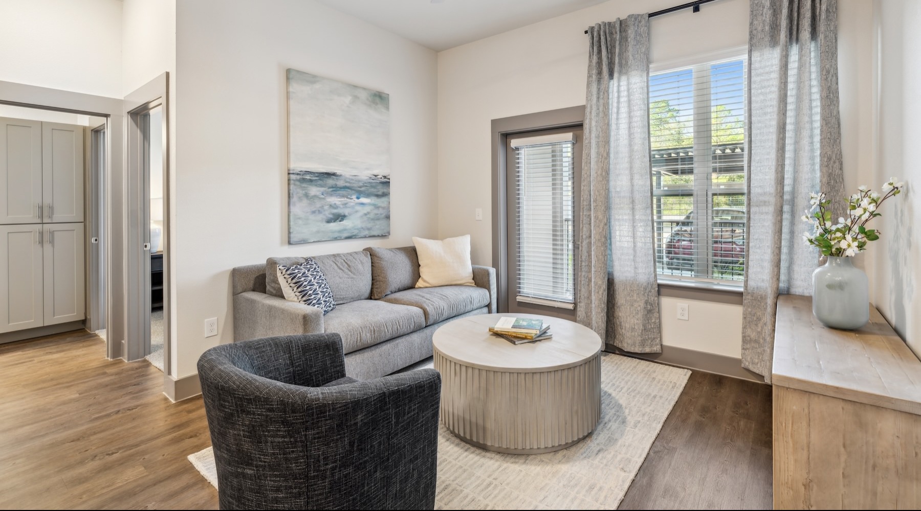 living room with a coch, chair and coffee table