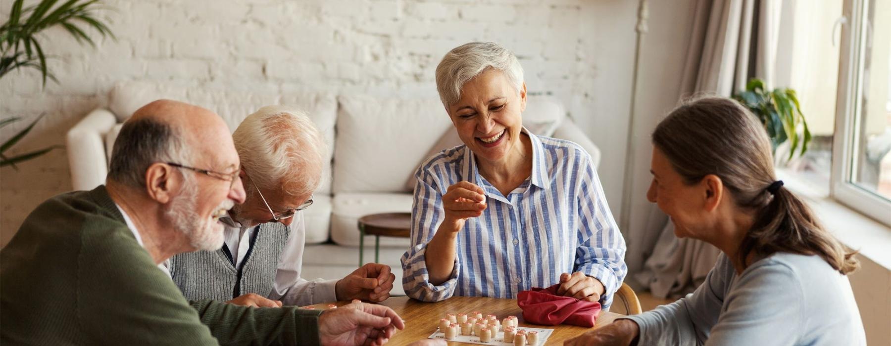 a group of people sitting around a table